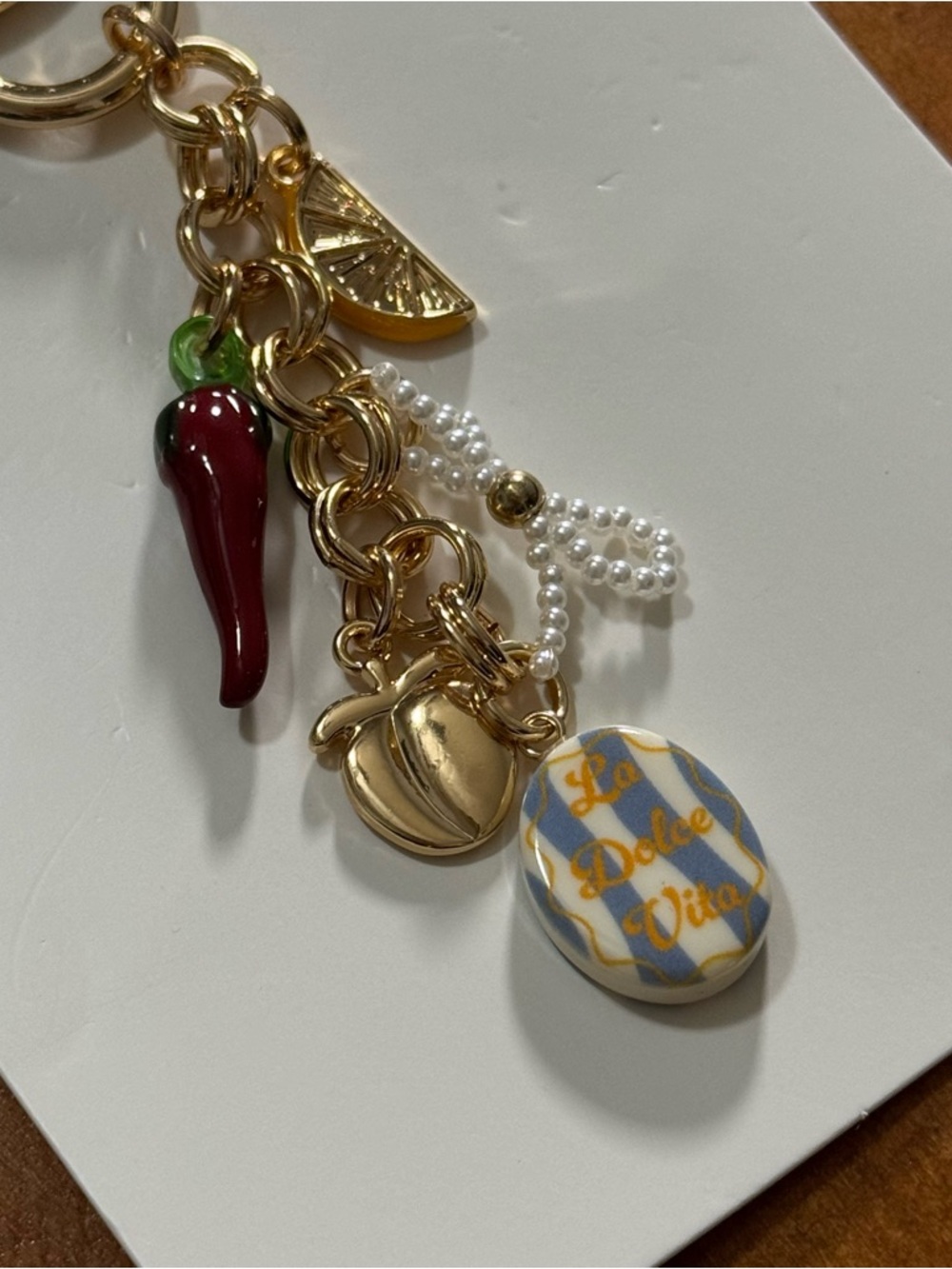 NEW Gold Charm Keychain with Red Chili & La Dolce Vita Pendant